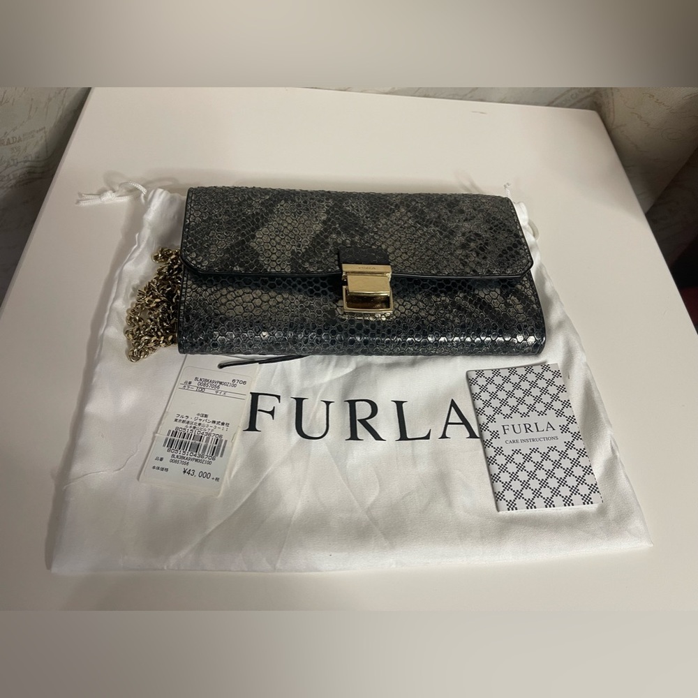 Furla sling bag with dustbag and care card